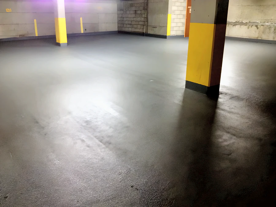 Kelmar FWC III round a yellow-banded column and turned up the wall base in the Beach Avenue apartments parkade, Vancouver