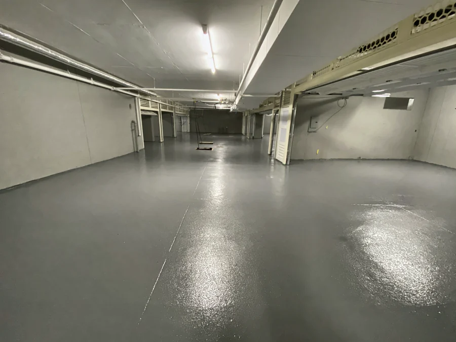 A finished parking level in the grey Tremco traffic coating