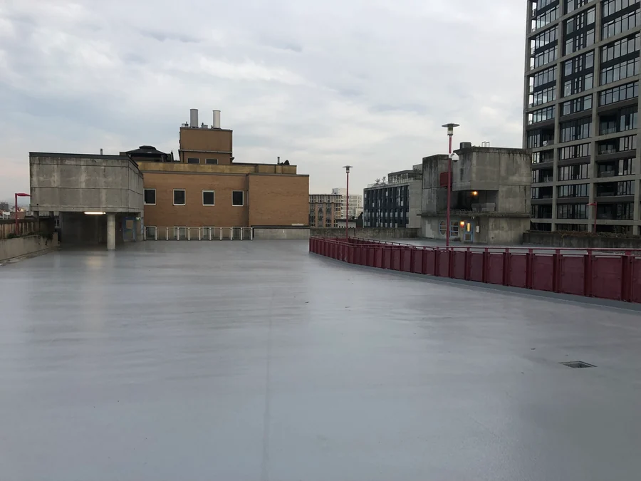 The finished roof deck along the railing to the stair tower