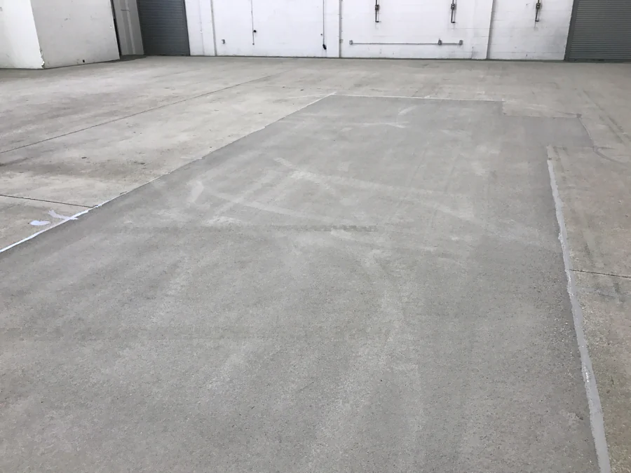 The same slab after shot blasting, clean and open, its joints and cracks filled
