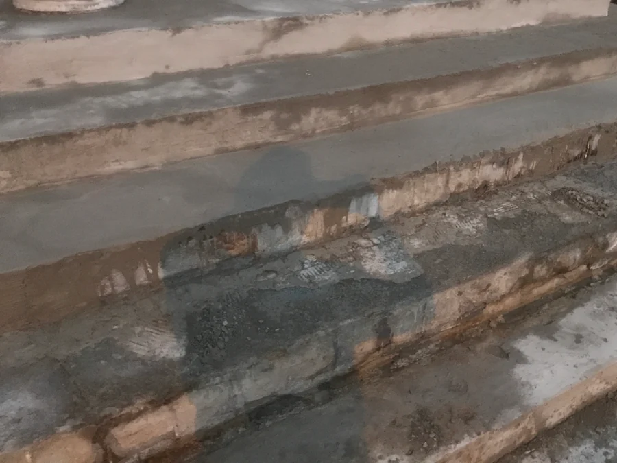 Repair layers built up on the lower front steps of a house in Kerrisdale, Vancouver, before coating