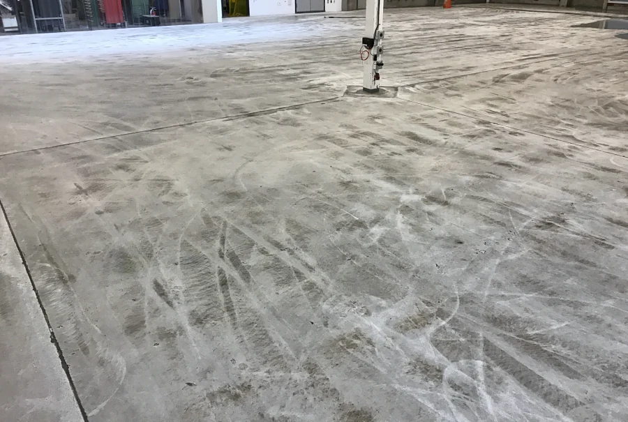 The concrete slab of a Kodak-owned printing company in Richmond, ground ahead of the ESD floor coating, the grinder’s swirl marks across it