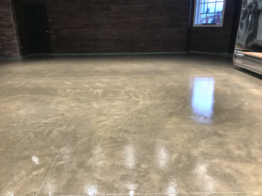 Clear epoxy and ResinTech CRU urethane over the concrete floor of a Langley farm market, the concrete’s colour and aggregate showing through