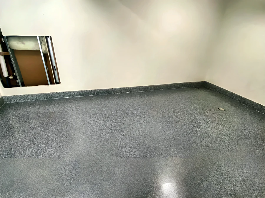 Grey decorative flake floor in a room at Mulgrave School