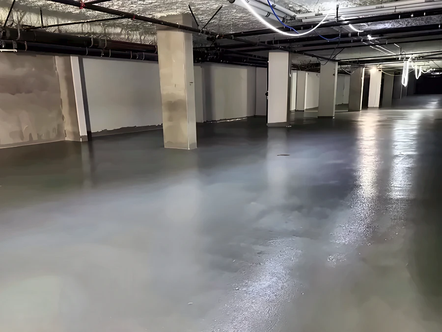 Finished grey traffic coating through an underground parkade level