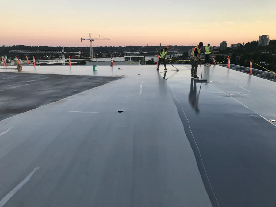 The Tremco Vulkem 350NF/950NF/951NF traffic coating going down across the rooftop helipad at Royal Columbian Hospital, New Westminster