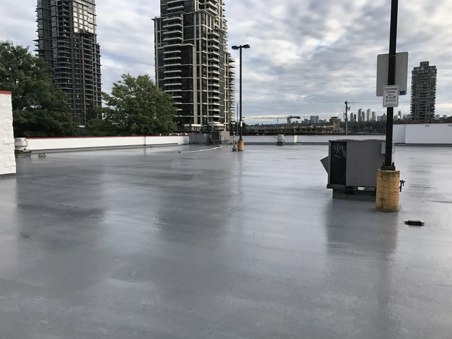 The finished rooftop deck in the grey Tremco Vulkem 350NF/950NF/951NF coat, 2017