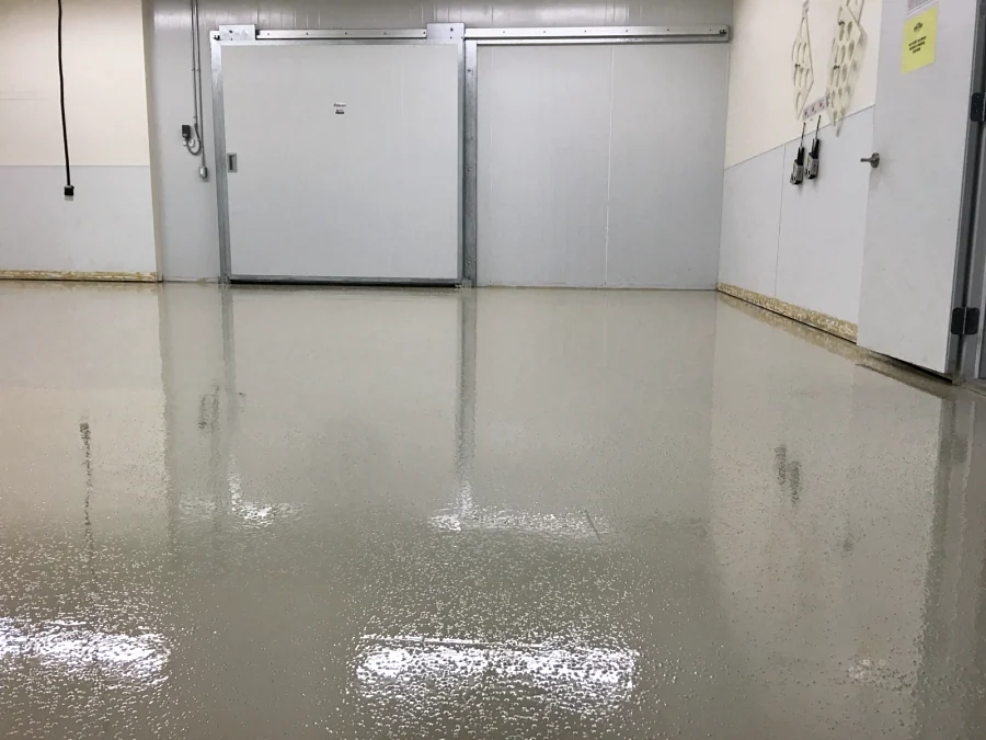 The glossy ResinTech CRU finish seen low across a walk-in cooler floor